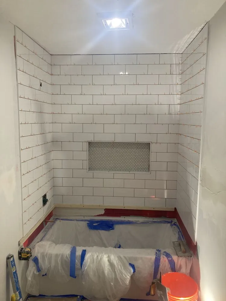 Slide of 2 Cousins Construction