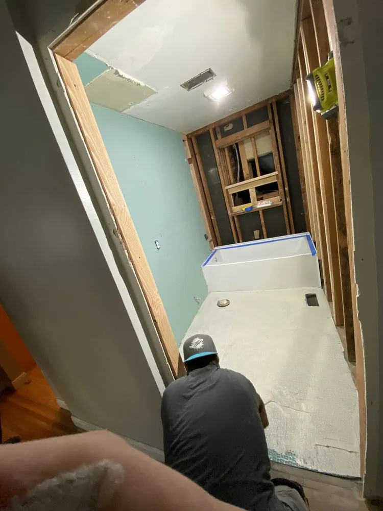 Slide of 2 Cousins Construction