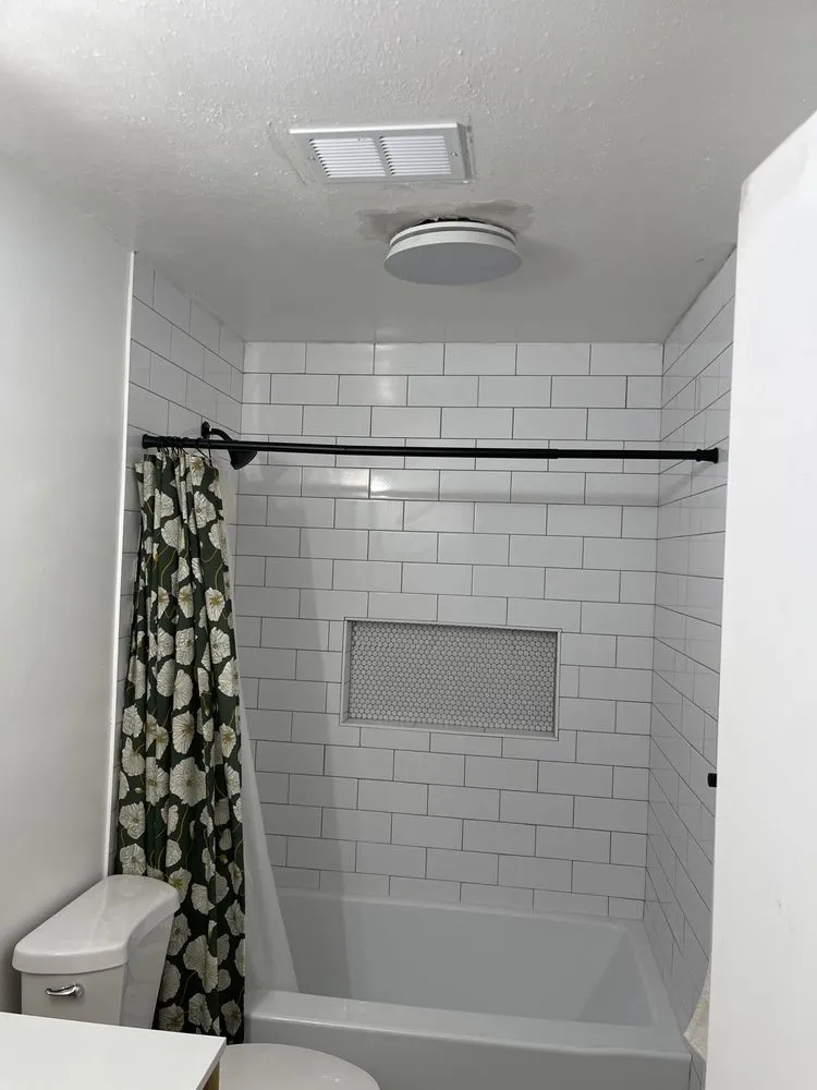 Slide of 2 Cousins Construction