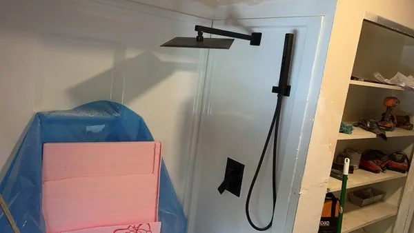 2 Men and a Wrench Logo