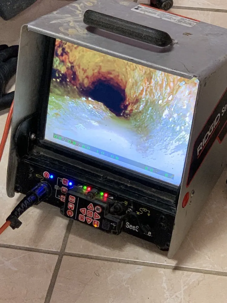 Slide of 24/7 Grease Trap & Services