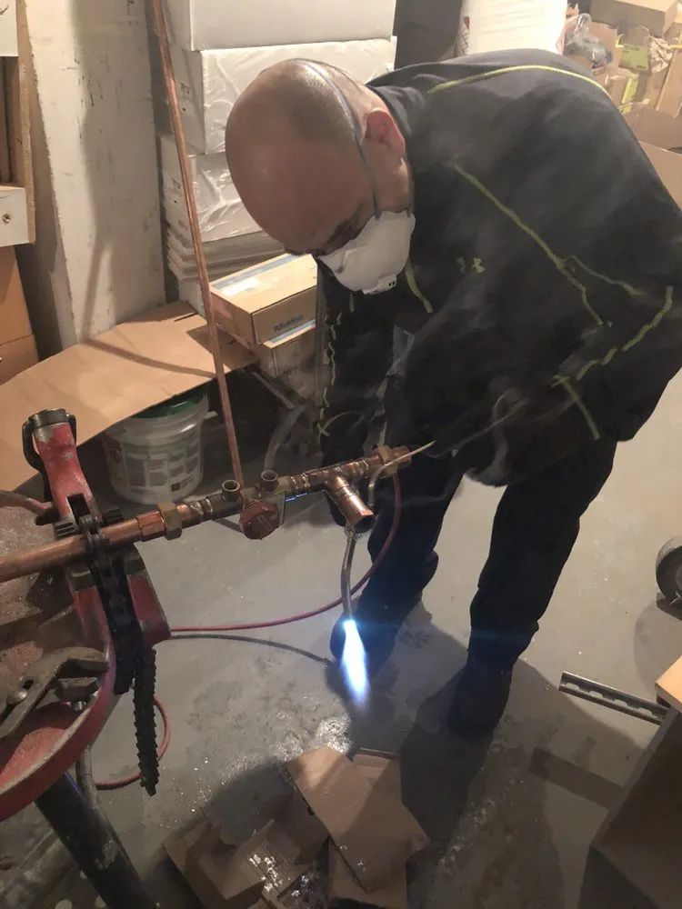 Slide of 3J's Drain Cleaning