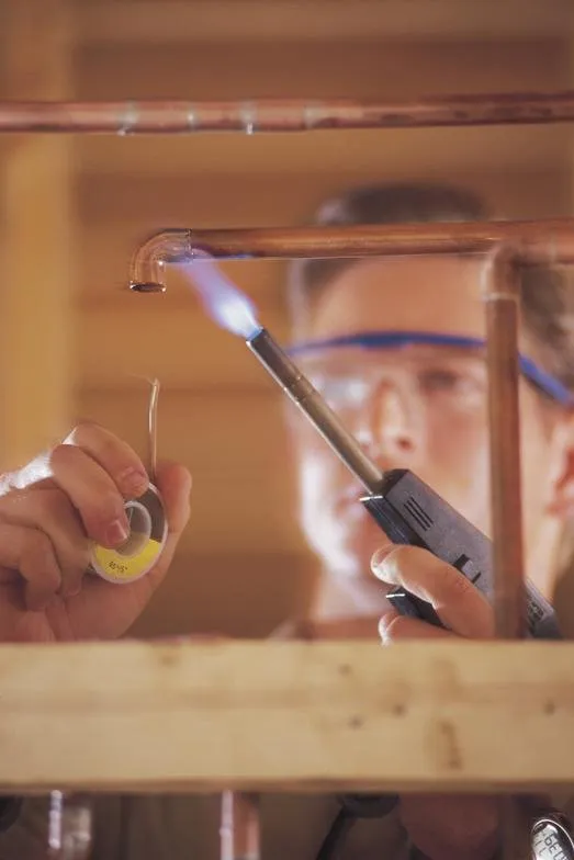 Slide of 4 A Plumber