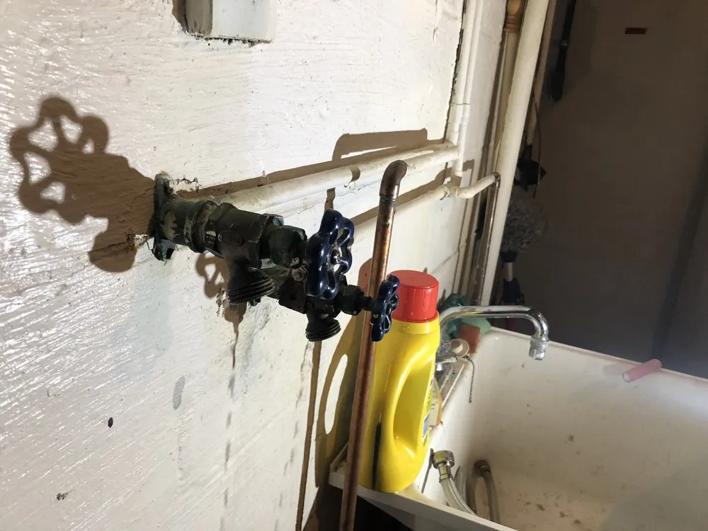 Slide of 703 Plumbers