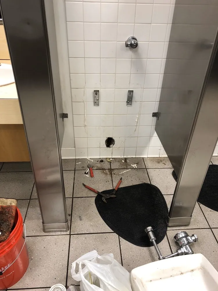 Slide of 703 Plumbers