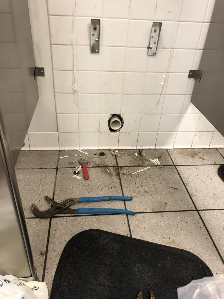 Slide of 703 Plumbers