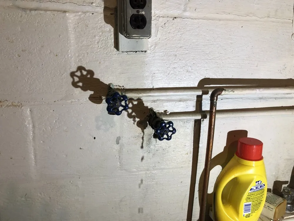 Slide of 703 Plumbers