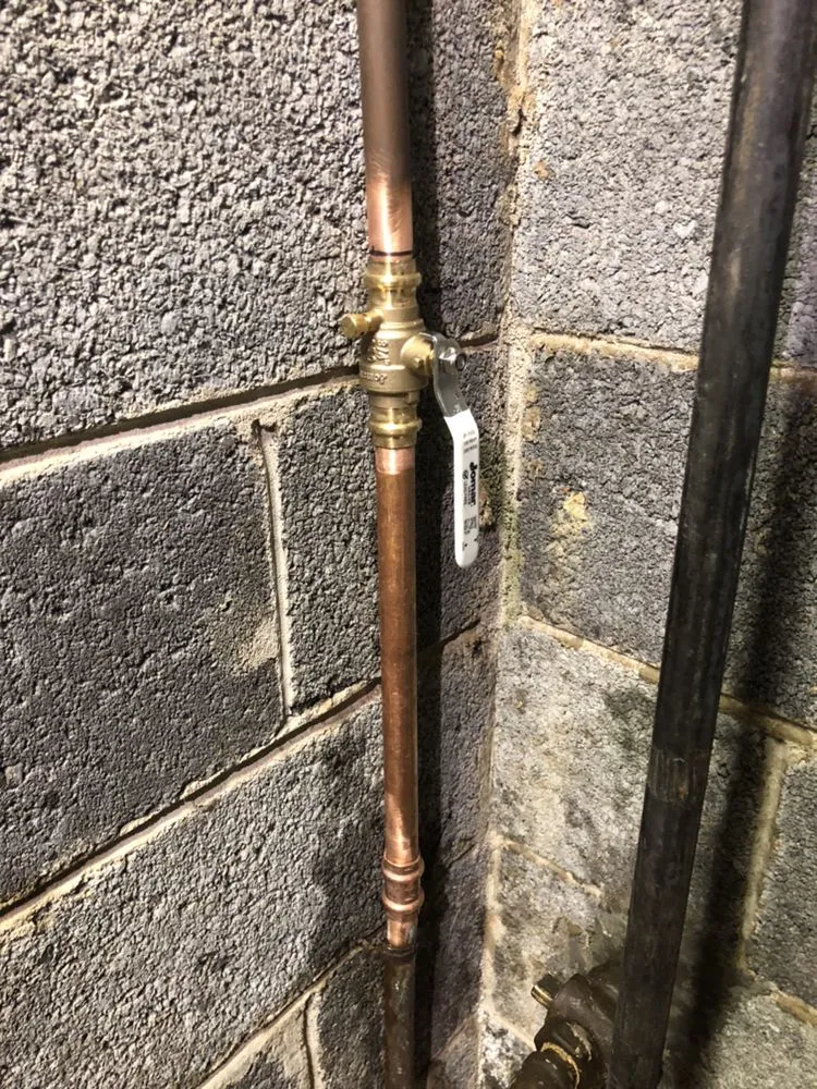 Slide of 703 Plumbers