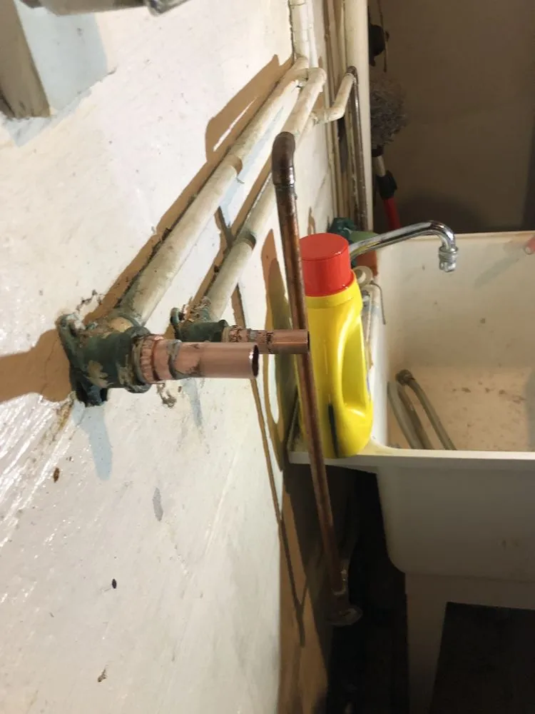 Slide of 703 Plumbers