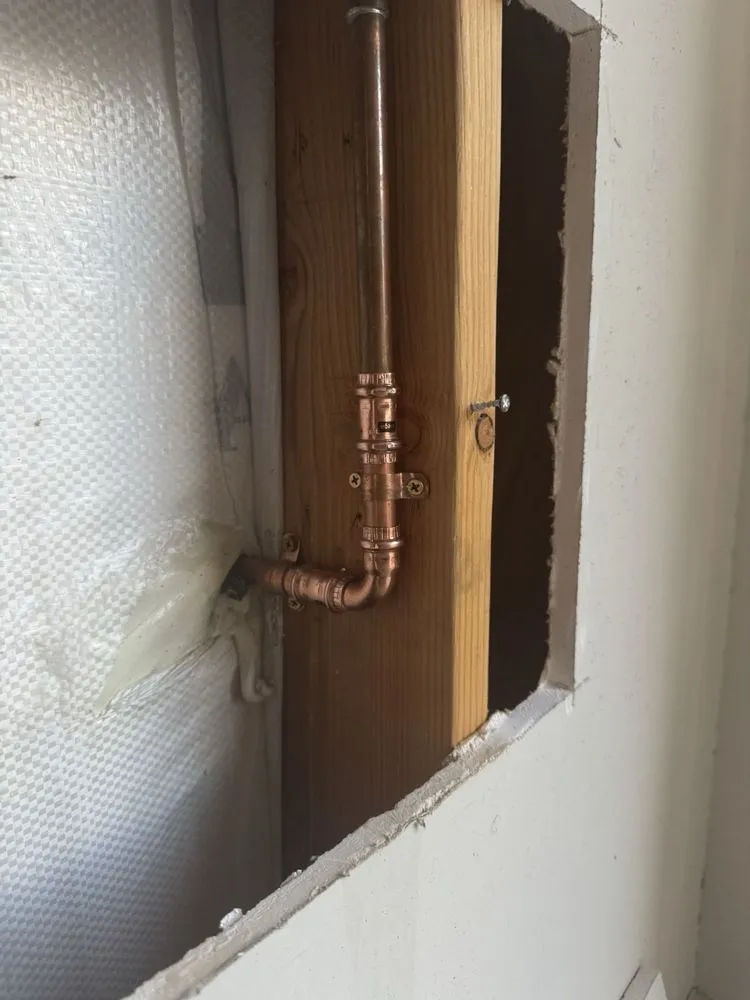 Slide of 9th Island Plumbing