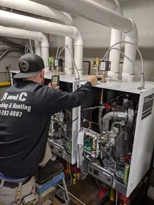 A and C Plumbing and Heating Logo