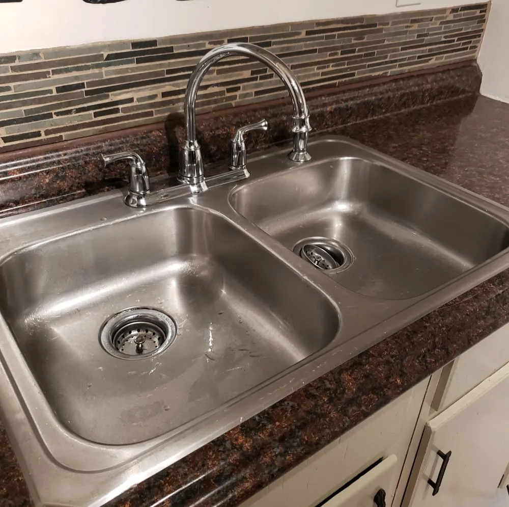 Slide of A Plumber Nearby