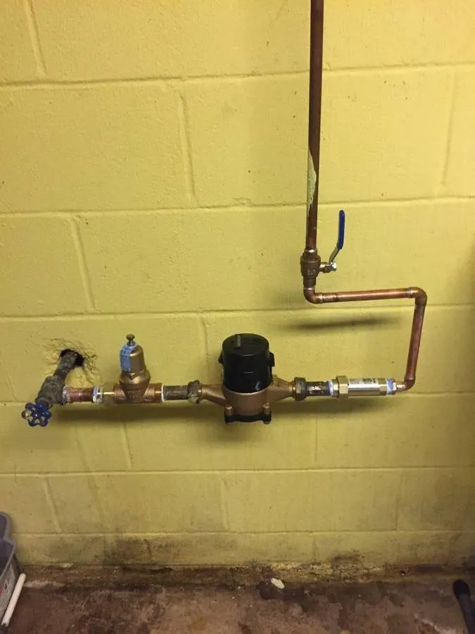 Slide of A Plumber Nearby