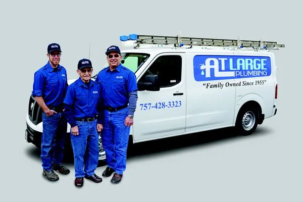 A T Large Plumbing Logo