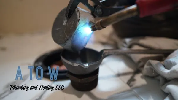 A to W Plumbing and Heating Logo