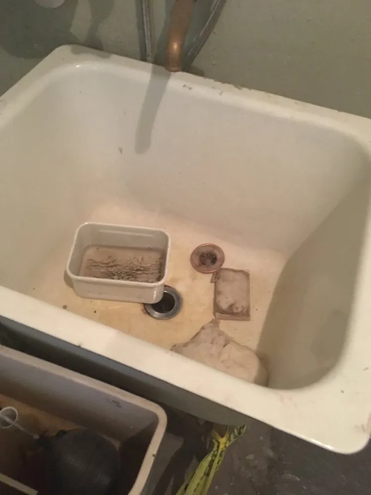 Slide of AA Plumbing & Drain Team