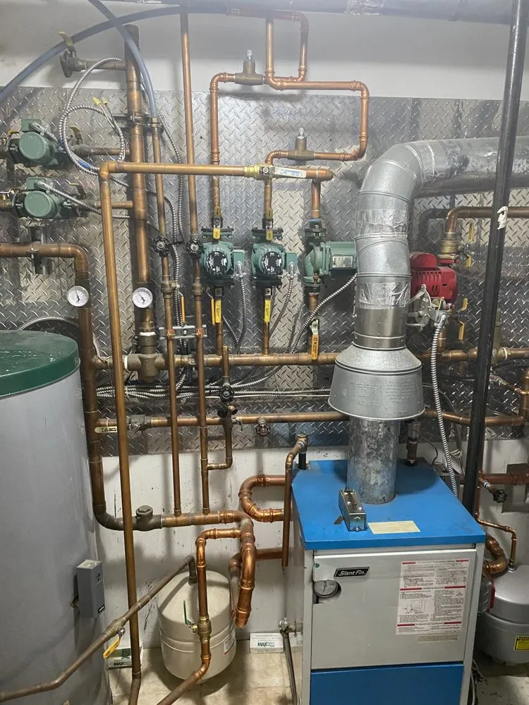 Slide of AAA plumbing and heating