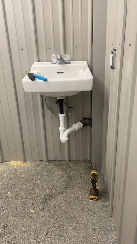 Slide of AAs Handyman