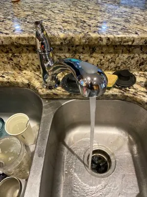 About Time Plumbing & Drain Cleaning Logo