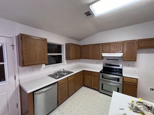 Above Improvements & Maintenance Logo