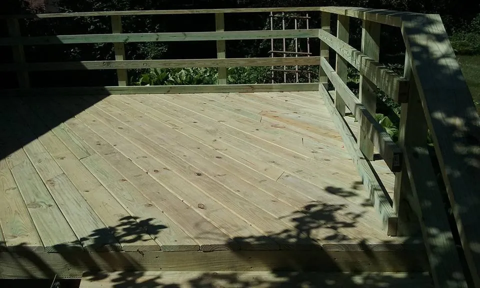 Professional water heater service in Burton, MI by Above The Rest Construction