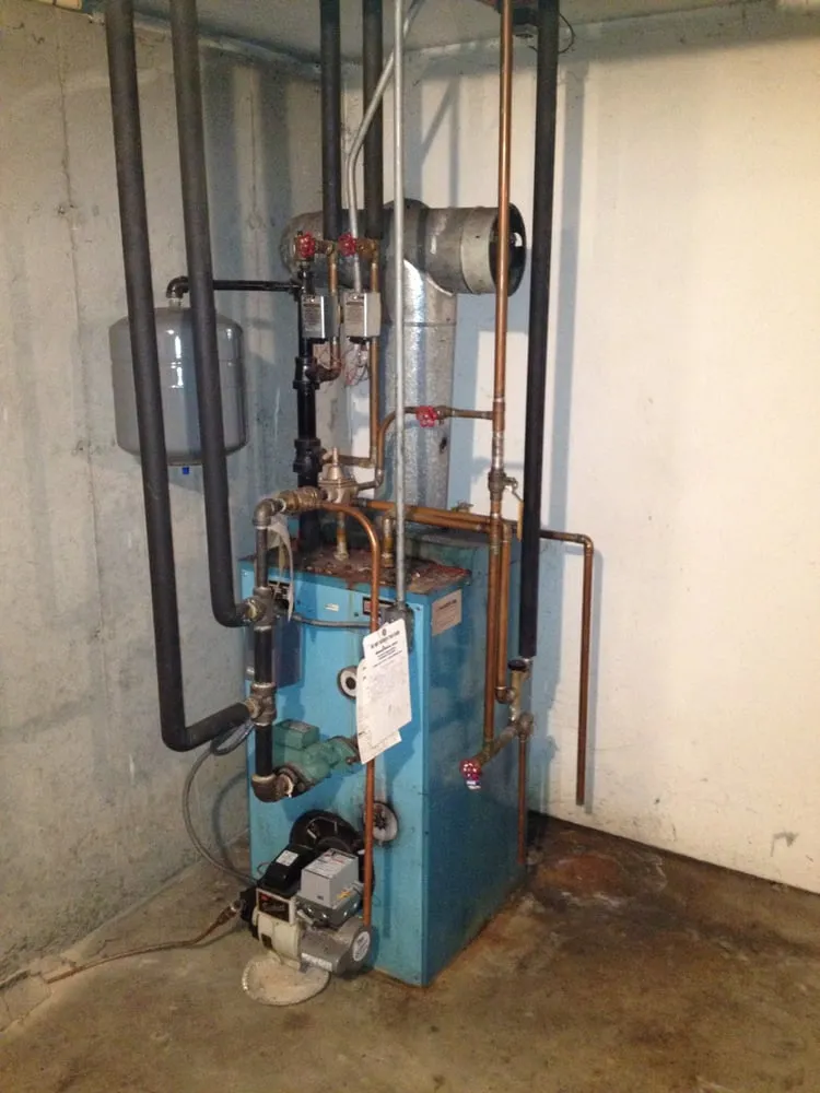 Professional water heater service in Middleton, MA by Absolute Precision Plumbing, Heating & Cooling