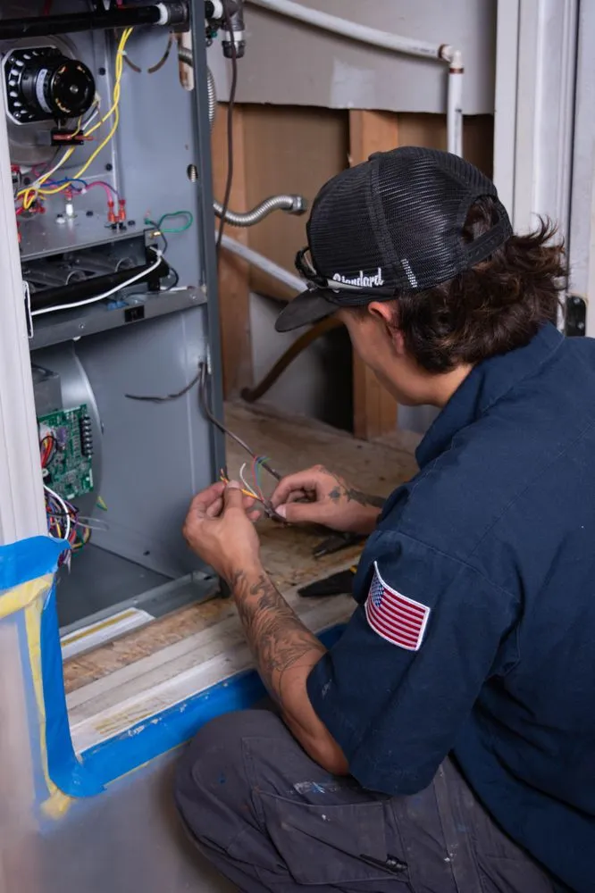 Slide of Action Plumbing, Heating, Air & Electric