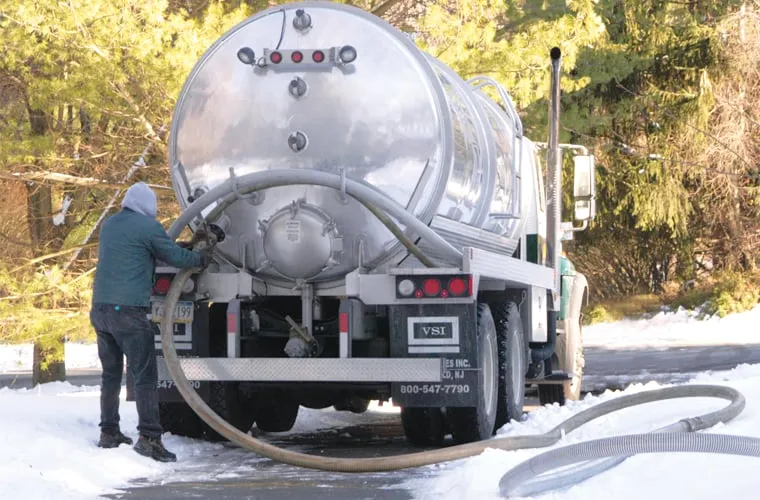 Slide of Action Sewer & Septic