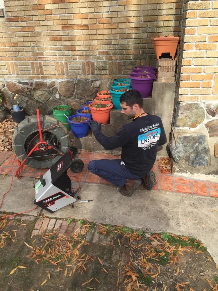 Slide of Affordable Rooter Service