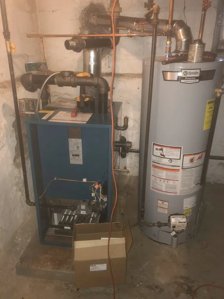 Affordable water heater service for homes in Bayside, NY by Ajax Plumbing & Heating