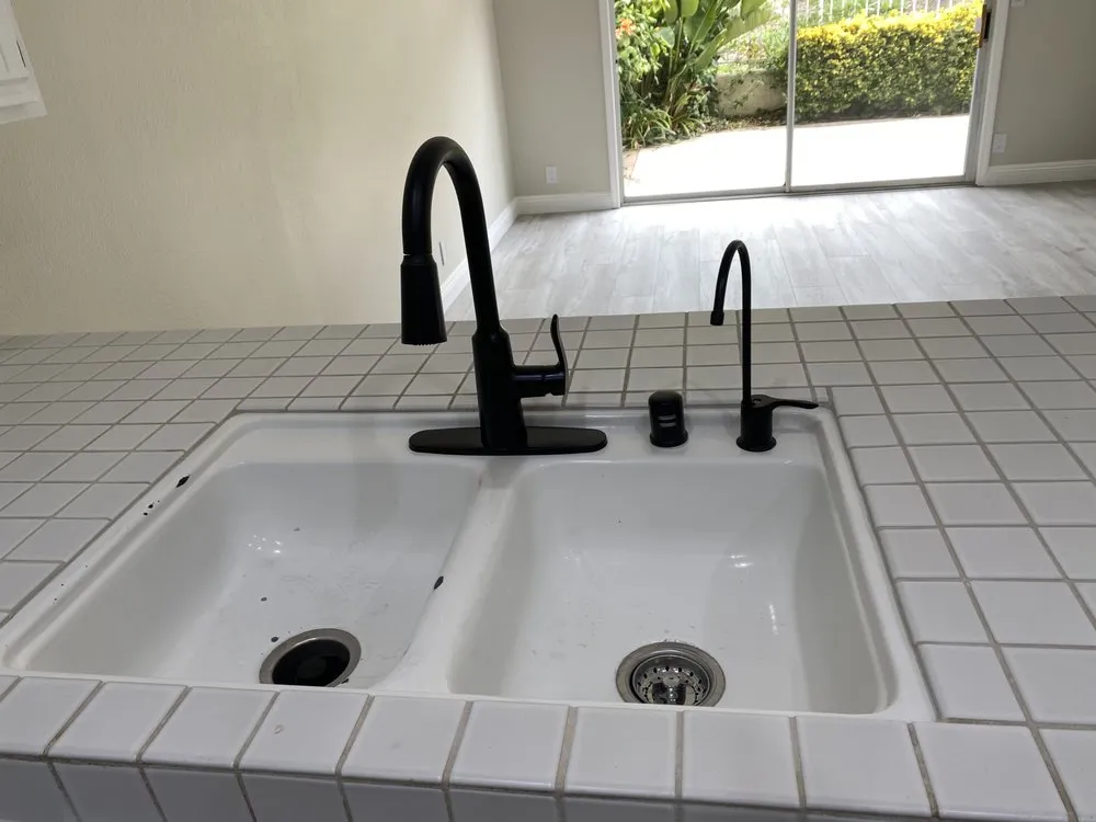 Slide of AJ’s Rootering and Services