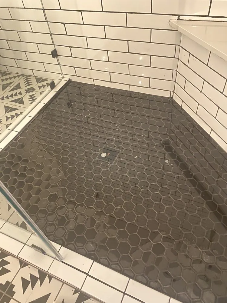 Slide of AJ’s Sewer & Drain