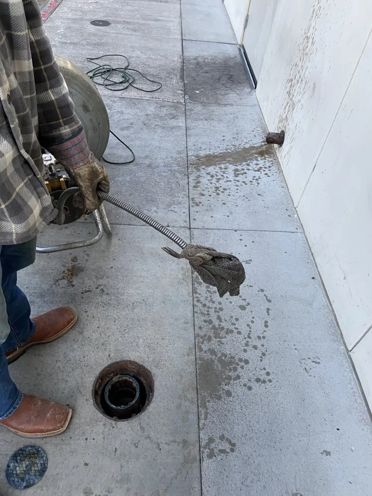 Slide of AJ’s Sewer & Drain