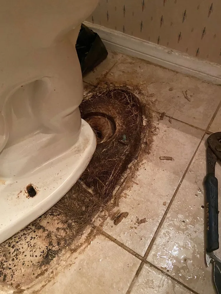 Slide of AJ’s Sewer & Drain