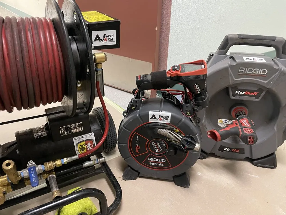 Slide of AJ’s Sewer & Drain