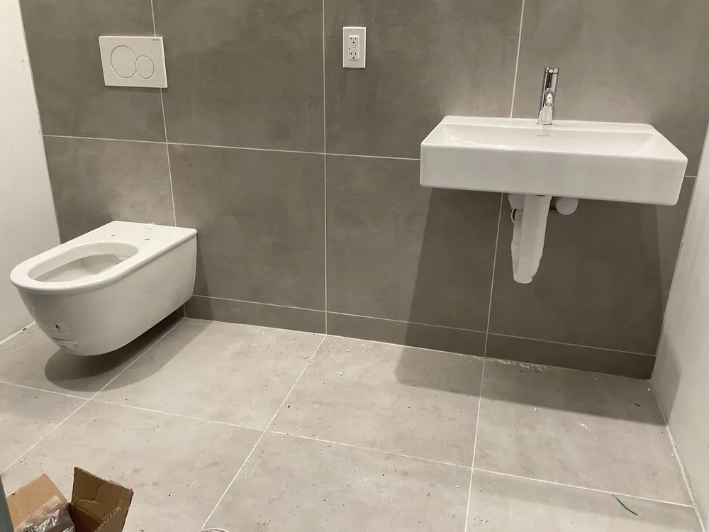 Slide of AKO Plumbing