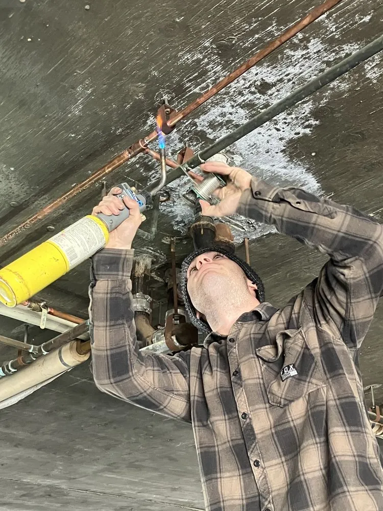 Slide of Alan's Plumbing Service