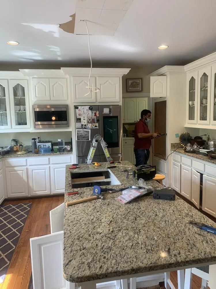 Slide of Ali Handyman