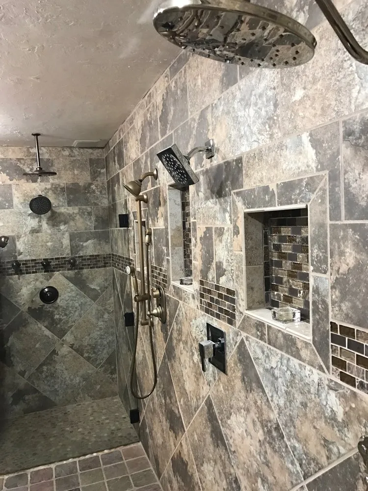 Slide of All American Construction & Plumbing