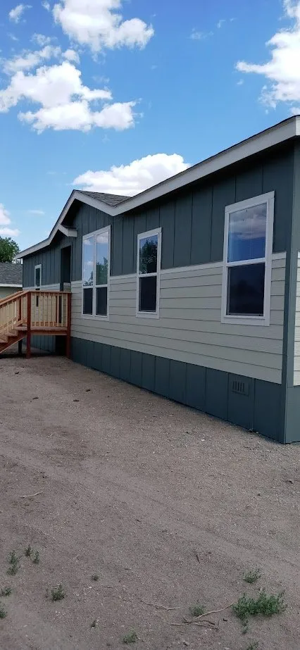 Slide of All American Mobile Home