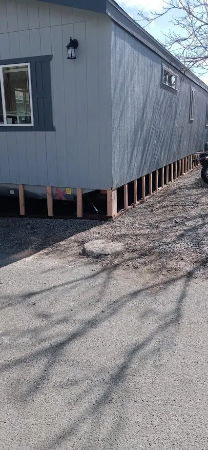 Slide of All American Mobile Home