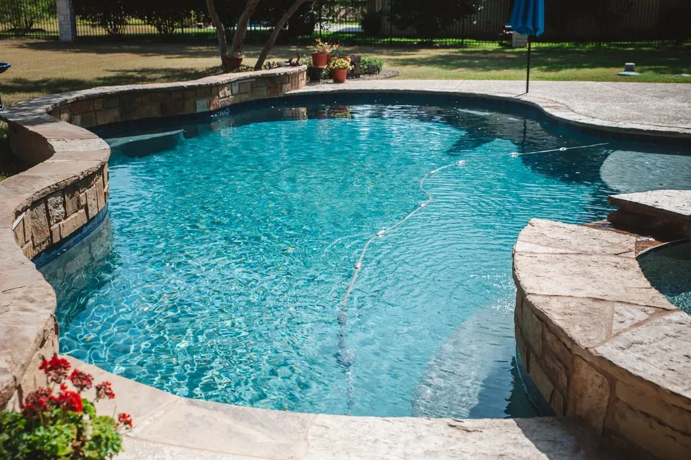Slide of All Pro Pools & Pavers