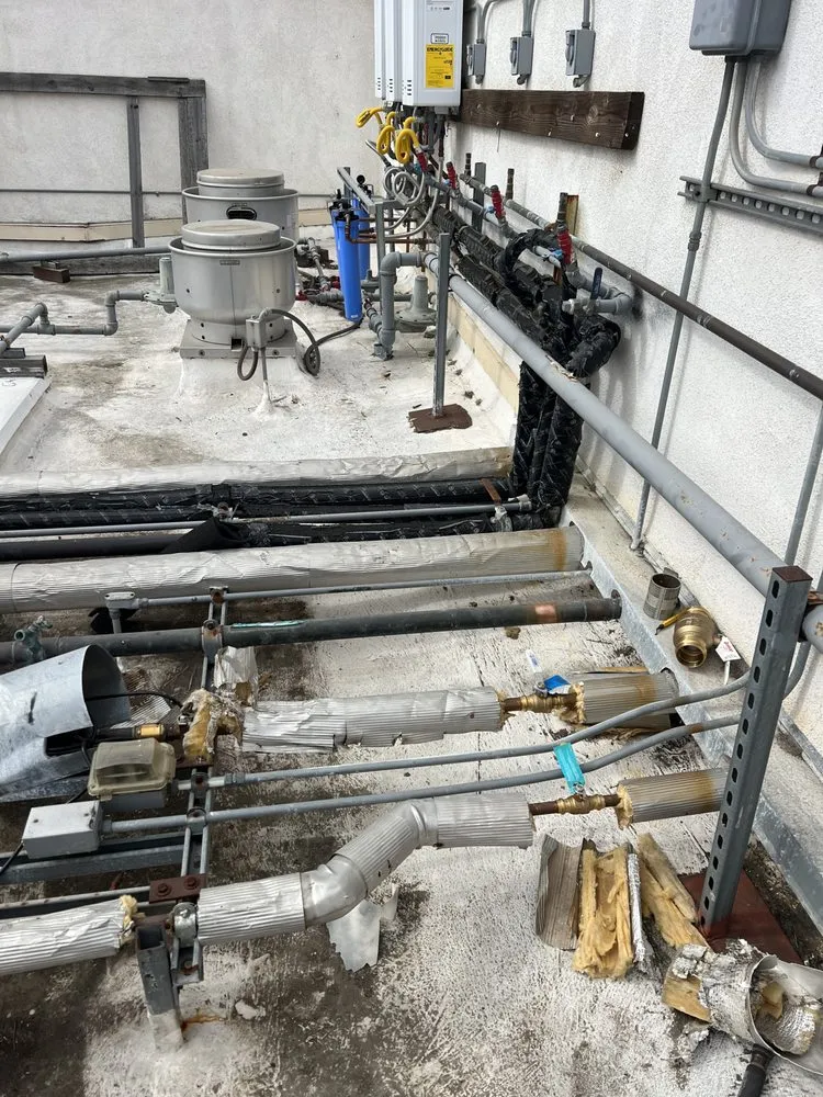 Slide of All Tankless Water Heater & Plumbing