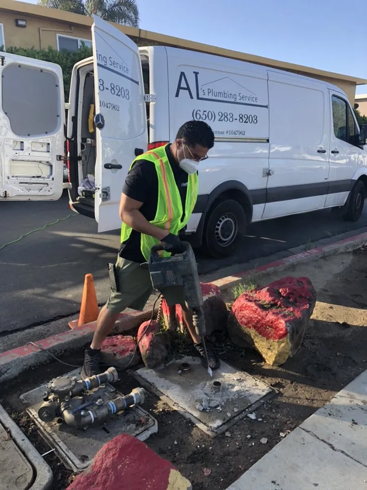 Slide of Al's Plumbing Service