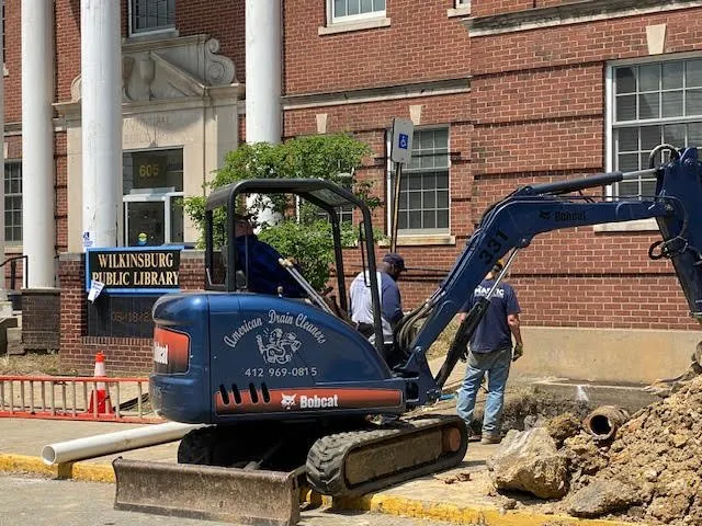 Slide of American Drain Cleaners