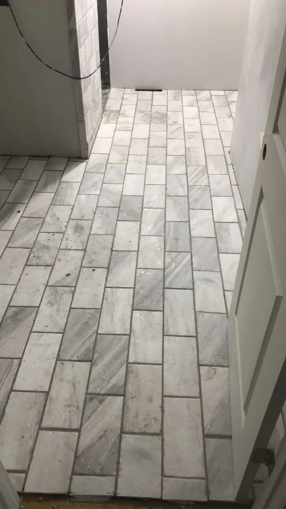 Slide of Anytime Renovation & Drain