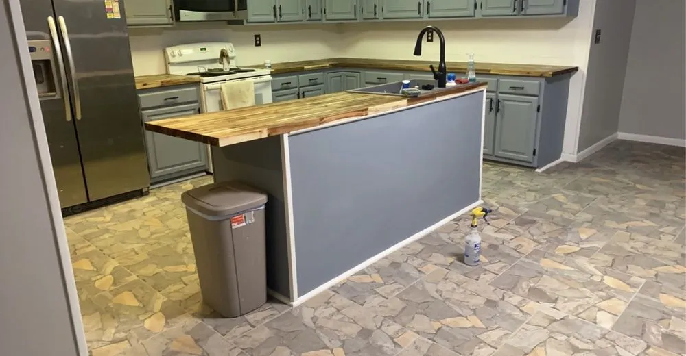 Slide of Anytime Renovation & Drain