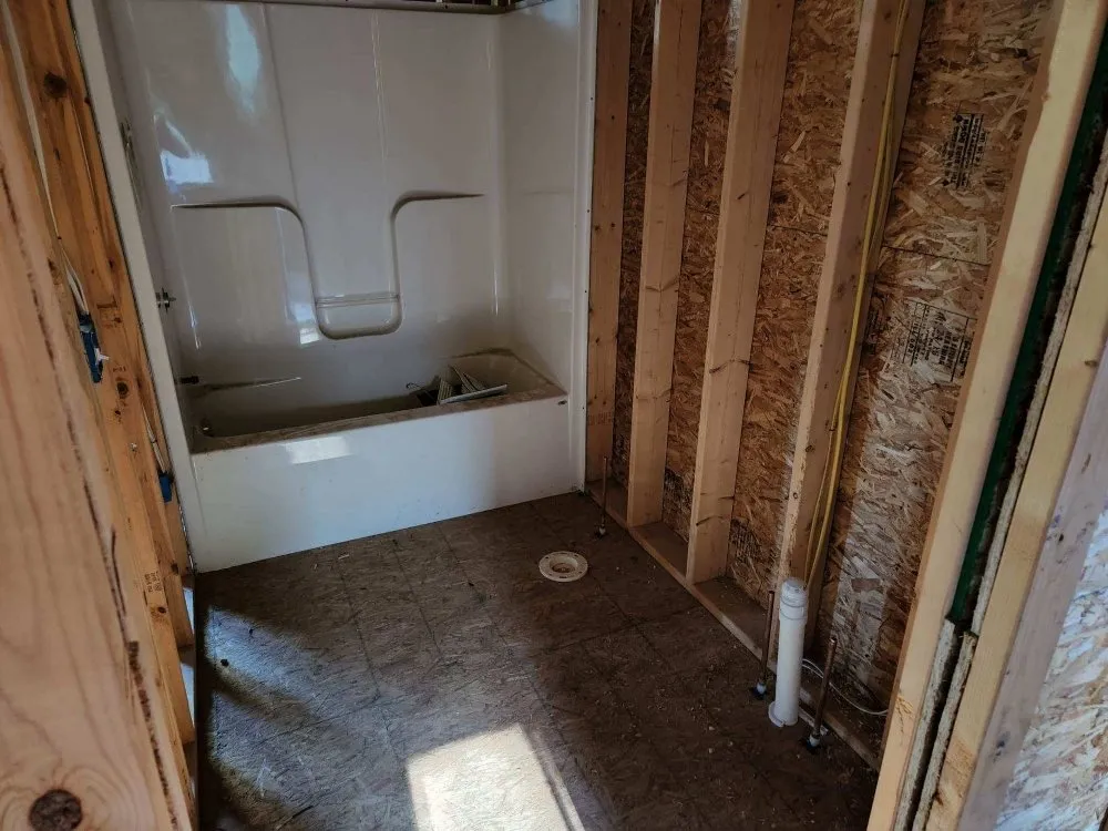 Top-rated water heater service for homes in Howard City, MI by Archimedes Plumbing