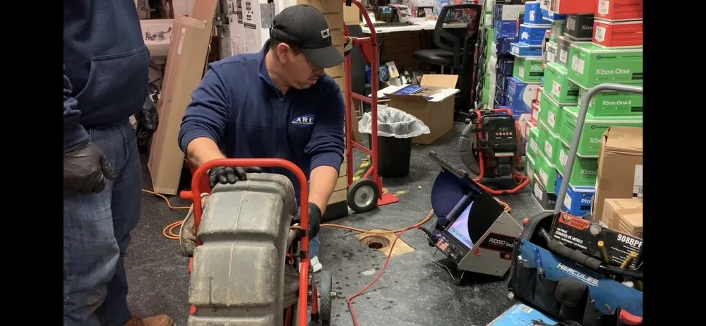 Slide of ART Drain Cleaning Services