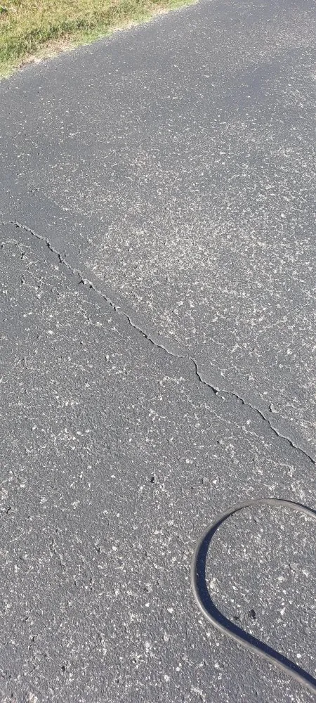 Slide of Asphalt Sealcoating & More